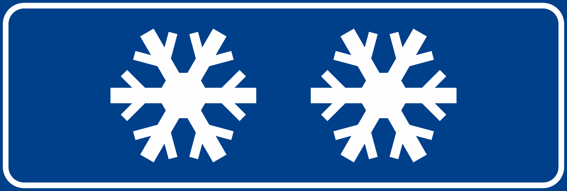 Strada sdrucciolevole per neve/ghiaccio